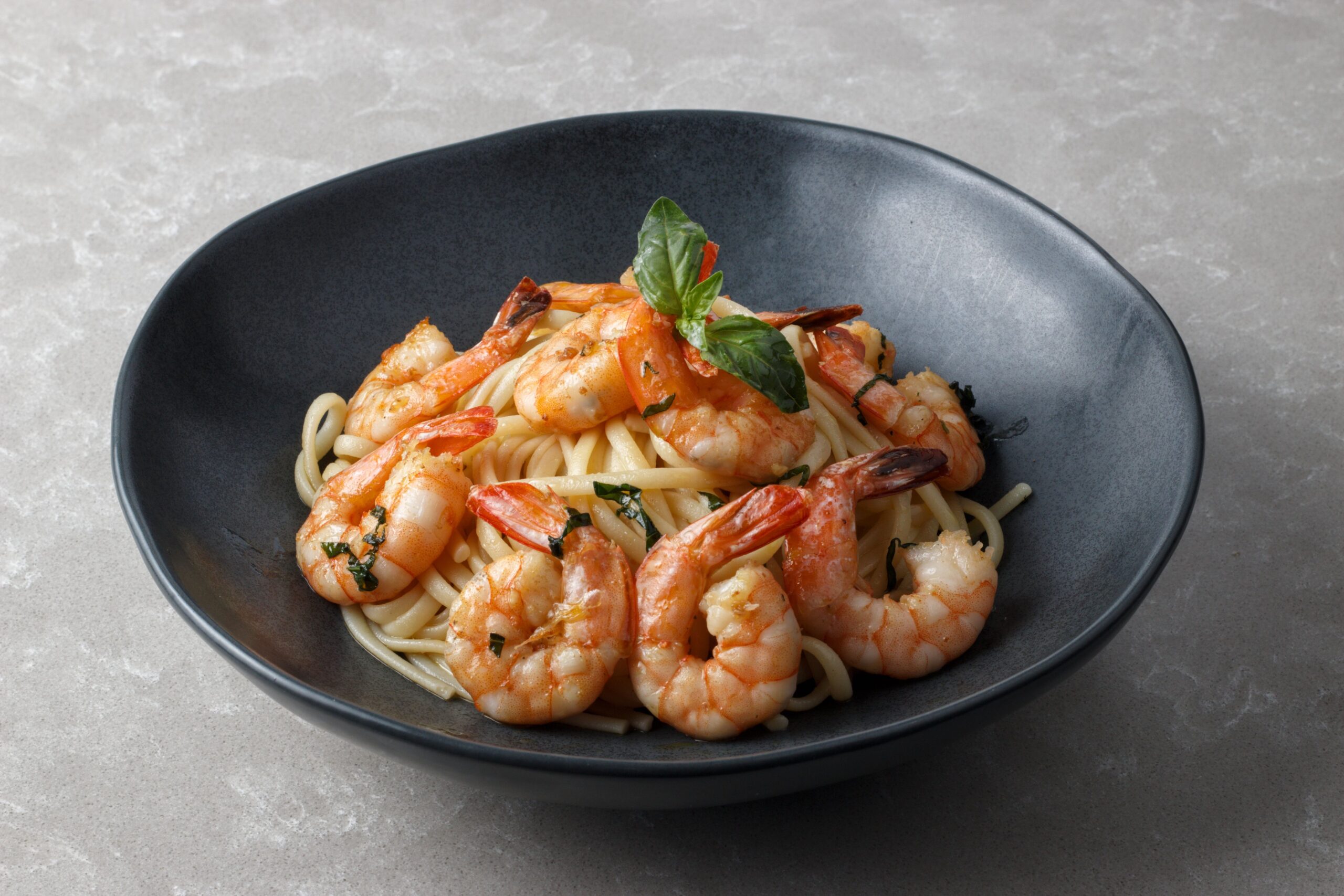 Garlic butter shrimp pasta tossed with fresh herbs and citrus