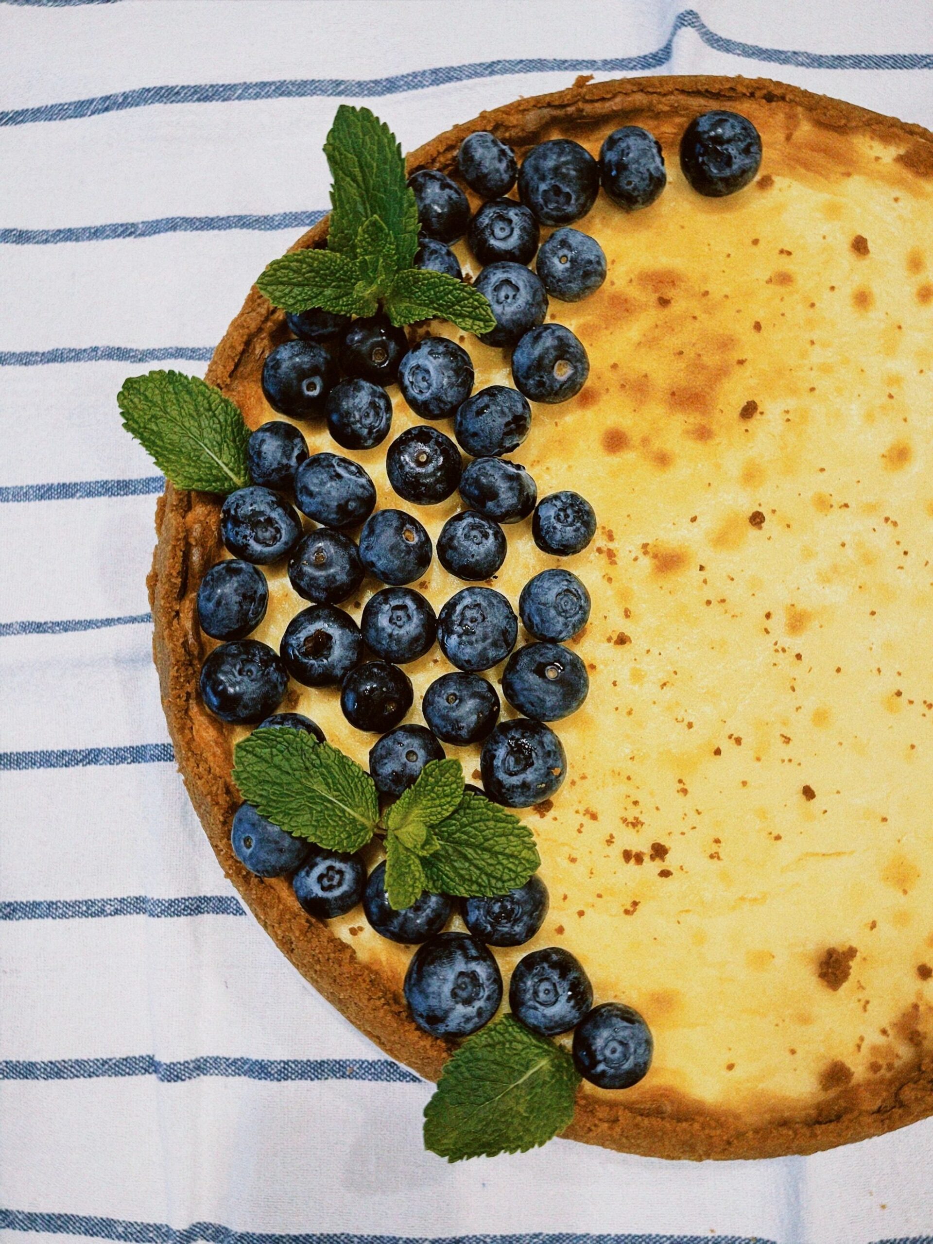 Smooth velvet cheesecake batter poured into a springform pan with a buttery graham crust